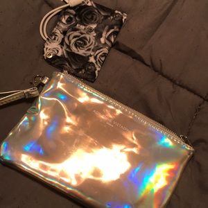 Holographic portable charger purse.